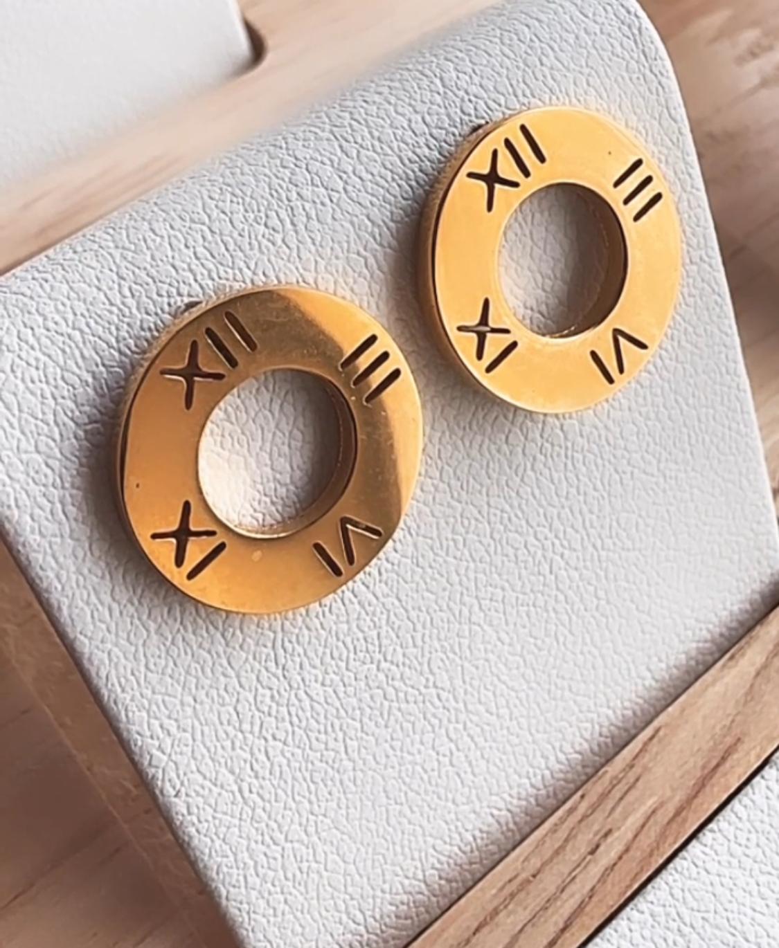 Caravanas de Acero con Números Romanos