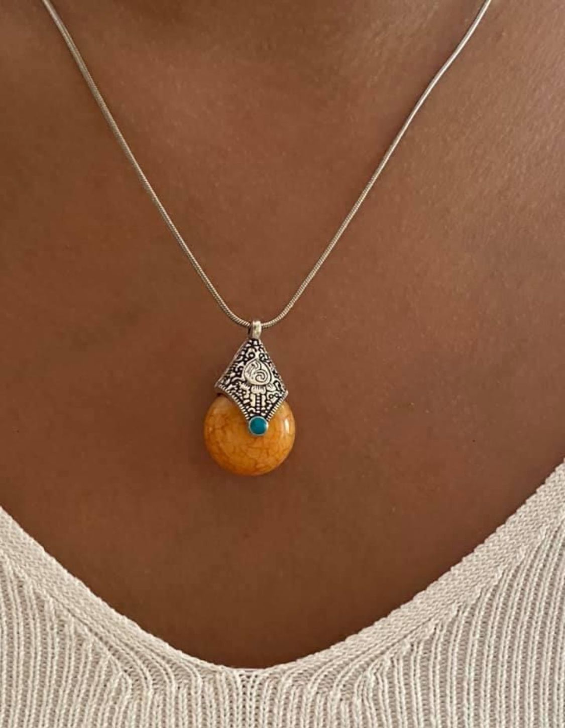 Cadena de Acero con dije de Resina y Acero