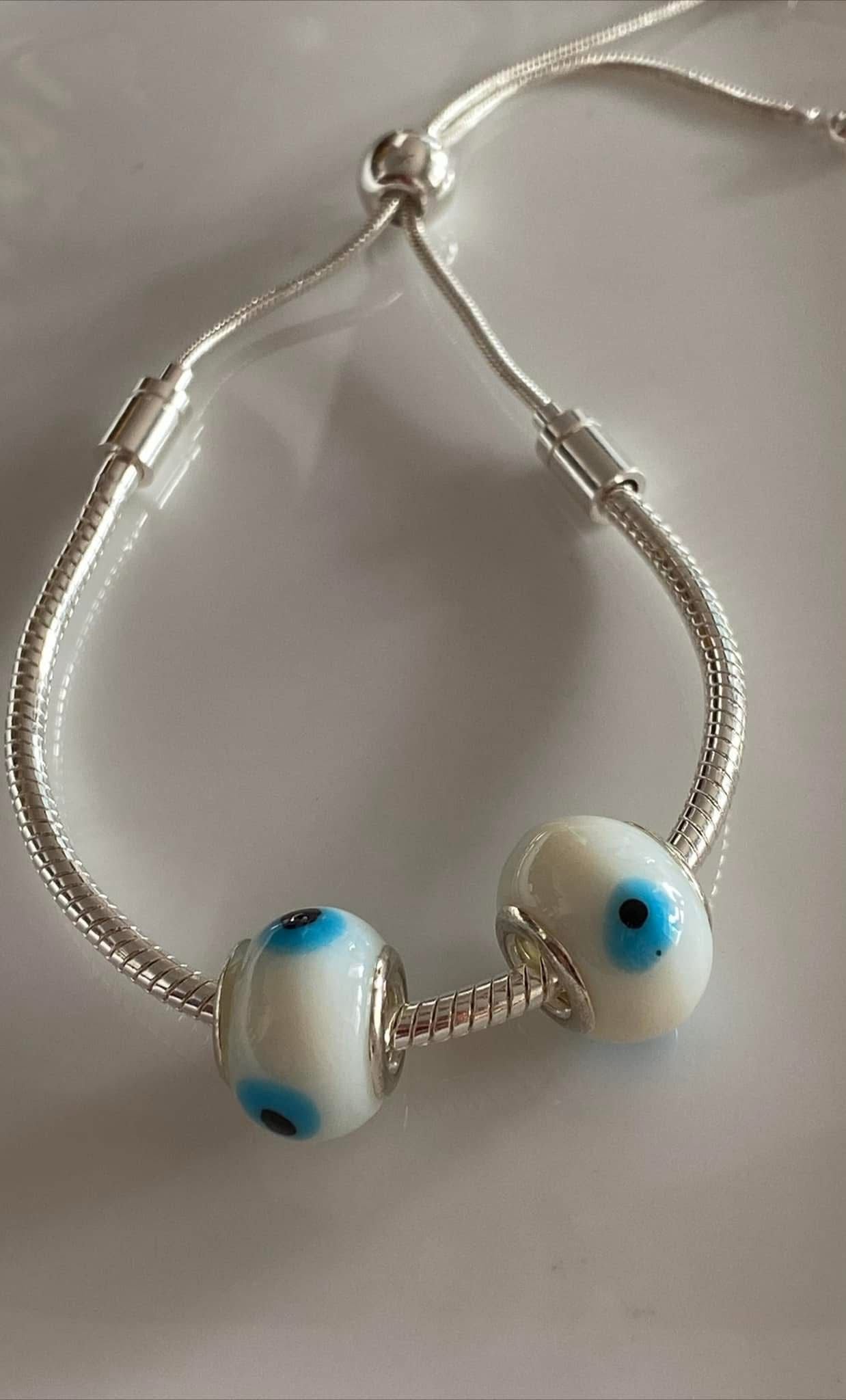 Pulsera con dijes de Murano