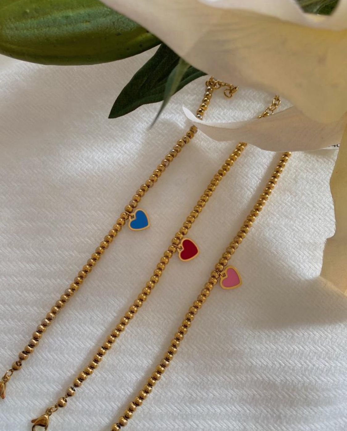 Set de pulseras de acero con corazones