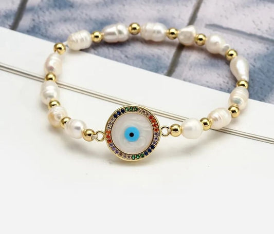 Pulsera de Perlas de Rio con Ojo en nácar y circonias
