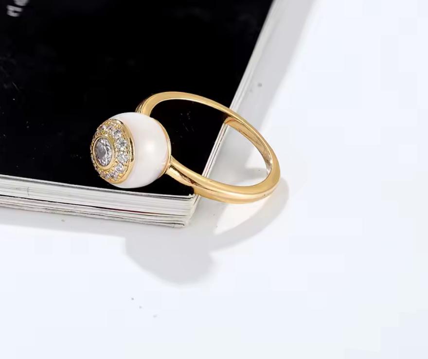 Anillo de acero bañado en Oro 18 No 7