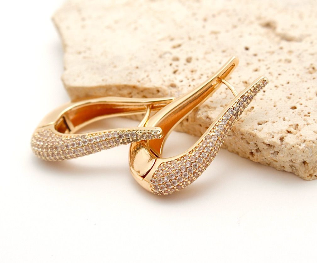 Caravanas de Acero bañadas en Oro 18