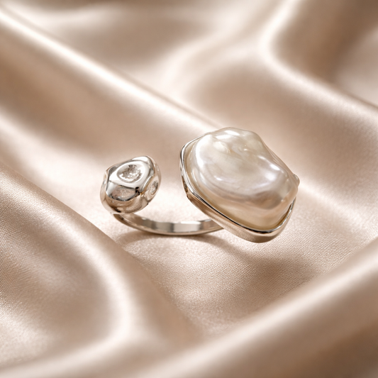 Anillo de acero con perla