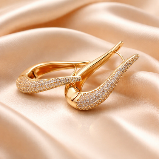 Caravanas de Acero bañadas en Oro 18