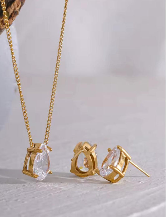 Conjunto de Cadena y Caravanas de Acero bañada en Oro 18