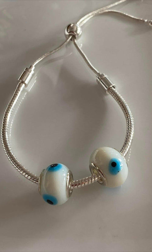 Pulsera con dijes de Murano
