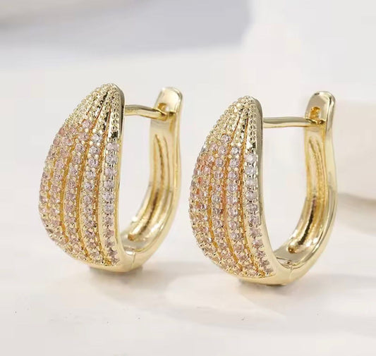 Caravanas de Acero bañadas en Oro 18