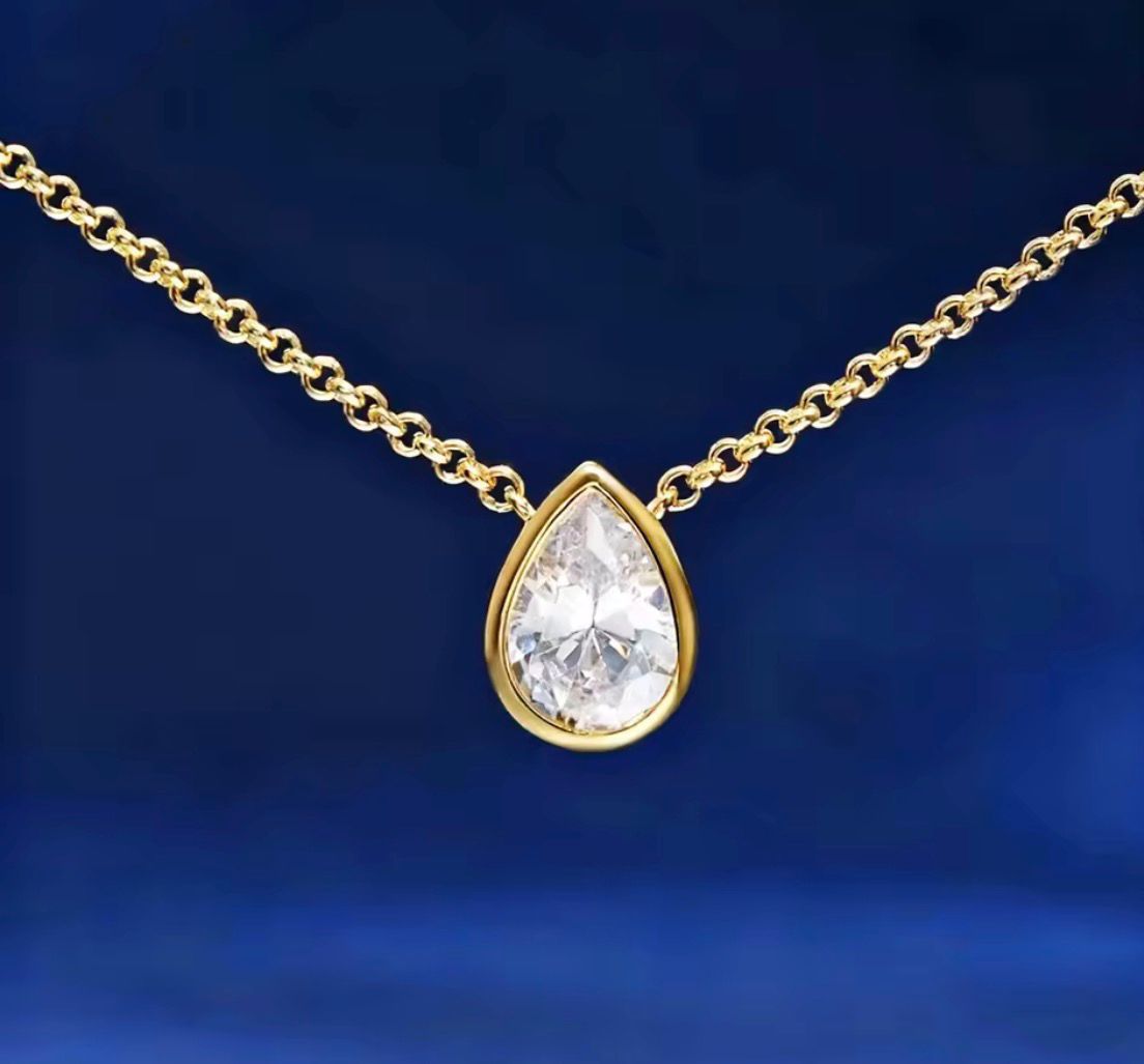 Cadena de Acero bañada en Oro 18 con dije de Circonia