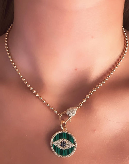 Cadena de Plata Italiana con baño de oro 18 cierre en circonias y Medalla de Malaquita y Circonias